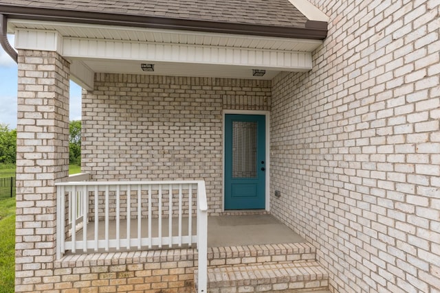 258 Jesse Dr, Pleasant View, TN 37146 - entrance to property with a shingled roof and brick siding