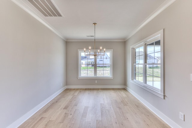4109 Fargo Ct, Murfreesboro, TN 37127 - spare room featuring a chandelier, light wood-style floors, ornamental molding, and baseboards