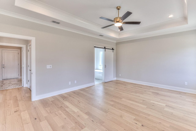 4109 Fargo Ct, Murfreesboro, TN 37127 - spare room featuring a raised ceiling, light wood-style floors, ceiling fan, baseboards, and ornamental molding