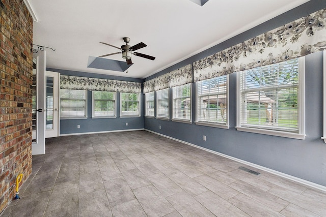 2506 Morgan Rd, Murfreesboro, TN 37129 - unfurnished sunroom featuring baseboards and brick wall
