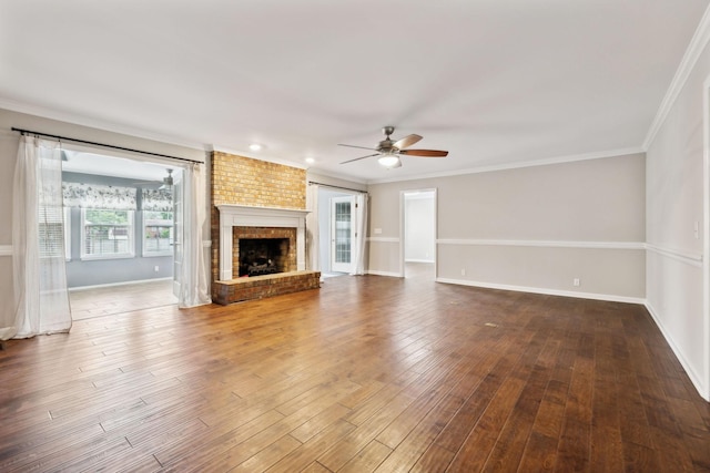 2506 Morgan Rd, Murfreesboro, TN 37129 - unfurnished living room featuring ceiling fan, wood finished floors, crown molding, a brick fireplace, and baseboards
