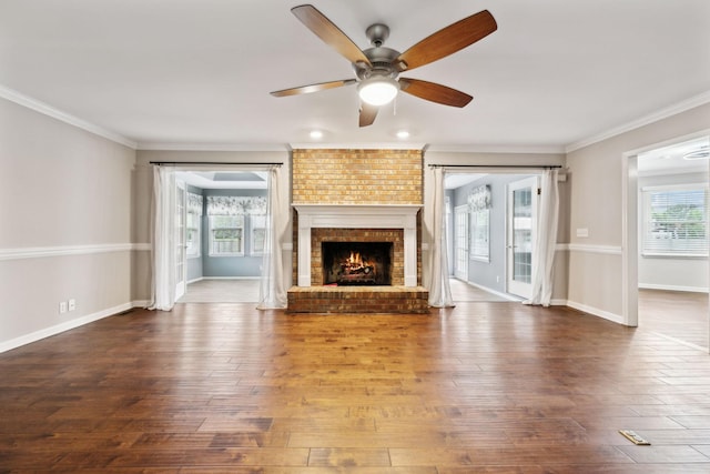 2506 Morgan Rd, Murfreesboro, TN 37129 - unfurnished living room featuring ceiling fan, plenty of natural light, wood-type flooring, and crown molding