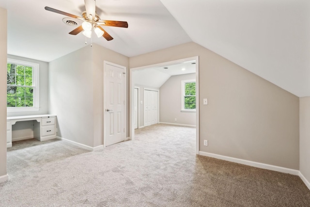 2506 Morgan Rd, Murfreesboro, TN 37129 - additional living space featuring vaulted ceiling, light carpet, ceiling fan, plenty of natural light, and baseboards