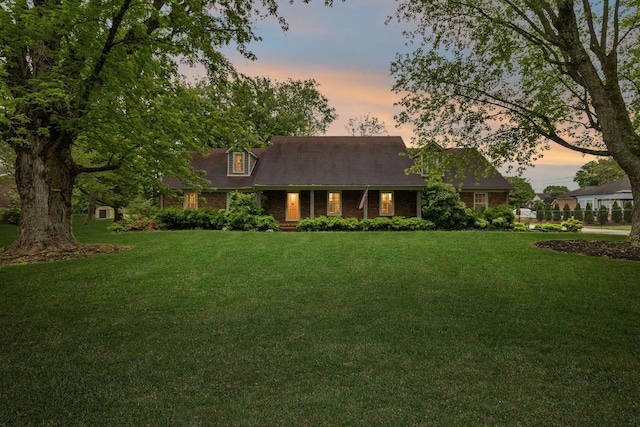 2506 Morgan Rd, Murfreesboro, TN 37129 - cape cod house with a yard and brick siding