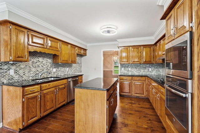 2506 Morgan Rd, Murfreesboro, TN 37129 - kitchen featuring stainless steel appliances, a sink, dark wood finished floors, ornamental molding, and brown cabinetry