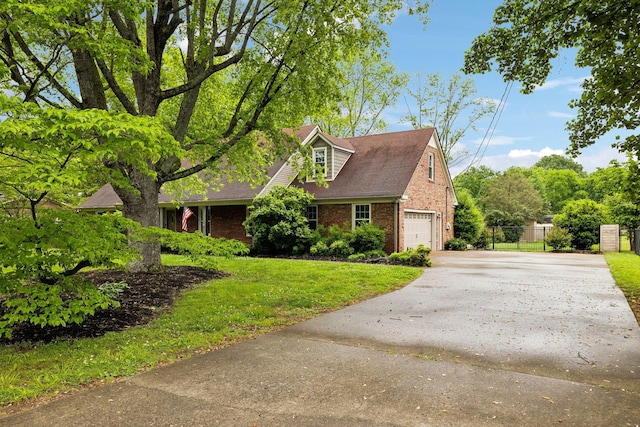 2506 Morgan Rd, Murfreesboro, TN 37129 - view of front of house featuring brick siding, concrete driveway, and a garage