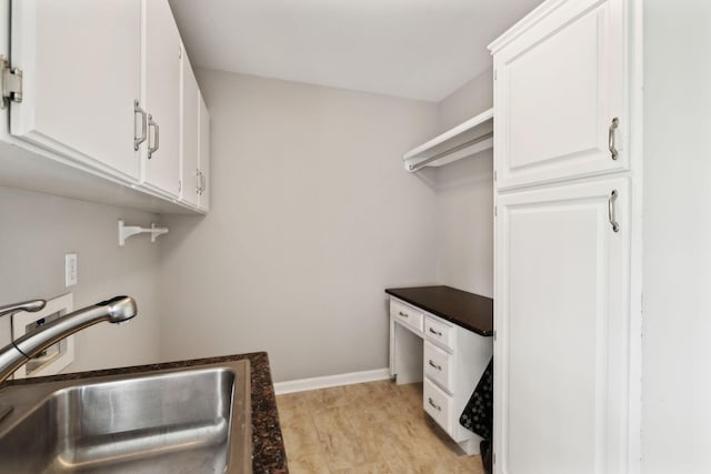 2506 Morgan Rd, Murfreesboro, TN 37129 - clothes washing area featuring cabinet space and baseboards