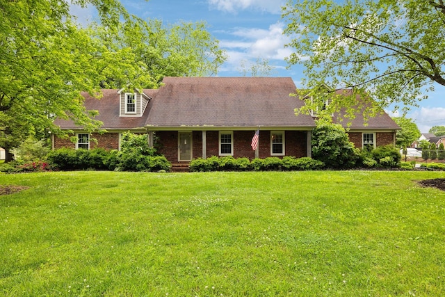 2506 Morgan Rd, Murfreesboro, TN 37129 - cape cod house featuring brick siding, a front yard, and roof with shingles