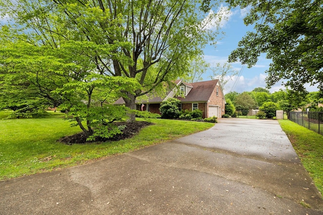 2506 Morgan Rd, Murfreesboro, TN 37129 - view of front of property featuring asphalt driveway, a garage, and brick siding