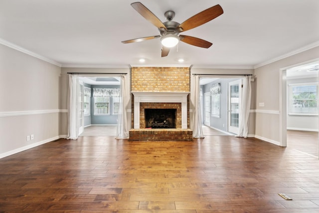 2506 Morgan Rd, Murfreesboro, TN 37129 - unfurnished living room with ceiling fan, plenty of natural light, wood-type flooring, and crown molding