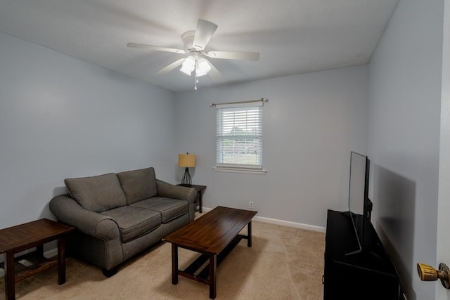 163 Heritage Trace Dr, Madison, TN 37115 - living room with light colored carpet, ceiling fan, and baseboards