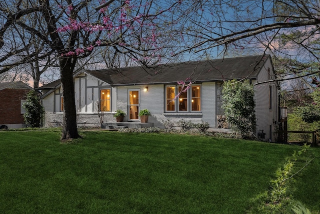 407 Wauford Dr, Nashville, TN 37211 - view of front of house with brick siding and a lawn