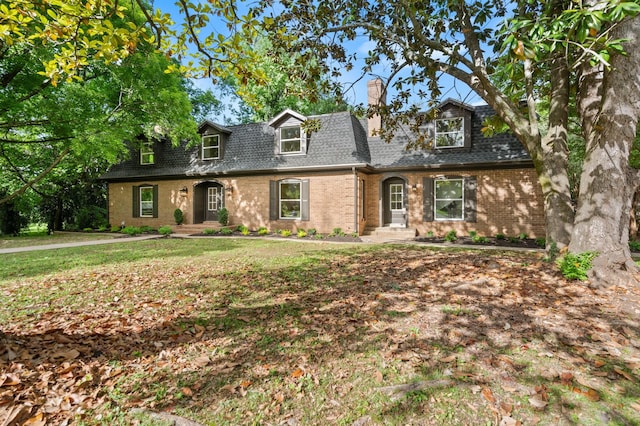 1311 Halifax Ct, Murfreesboro, TN 37130 - view of front of home with brick siding, a shingled roof, a chimney, and a front lawn