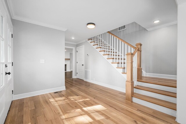 1311 Halifax Ct, Murfreesboro, TN 37130 - entrance foyer featuring stairs, crown molding, baseboards, wood finished floors, and recessed lighting