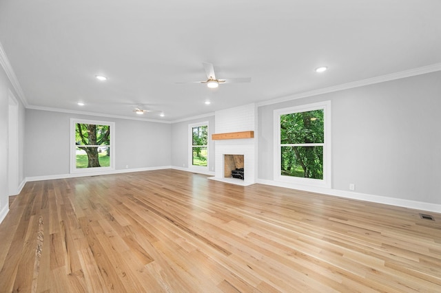 1311 Halifax Ct, Murfreesboro, TN 37130 - unfurnished living room featuring crown molding, light wood finished floors, baseboards, recessed lighting, and ceiling fan