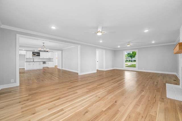 1311 Halifax Ct, Murfreesboro, TN 37130 - unfurnished living room with a ceiling fan, light wood finished floors, recessed lighting, crown molding, and baseboards