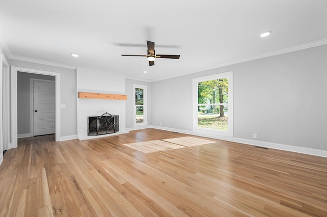 1311 Halifax Ct, Murfreesboro, TN 37130 - unfurnished living room with a ceiling fan, light wood-type flooring, ornamental molding, baseboards, and a fireplace