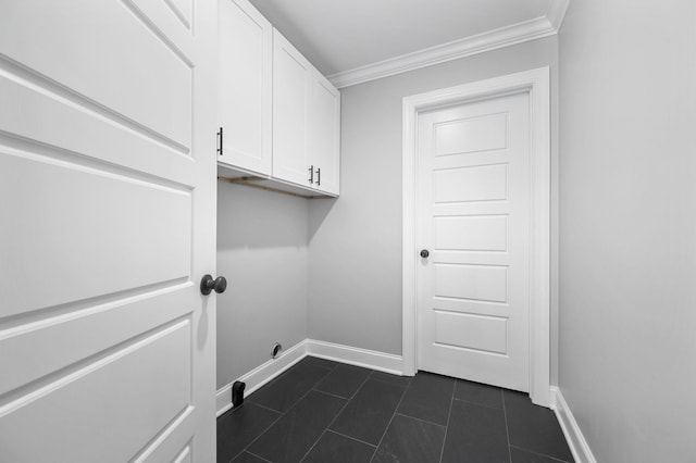 1311 Halifax Ct, Murfreesboro, TN 37130 - washroom featuring ornamental molding, baseboards, dark tile patterned flooring, cabinet space, and hookup for an electric dryer