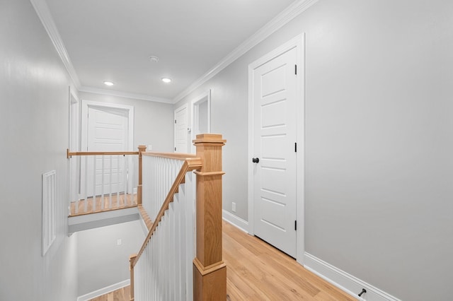 1311 Halifax Ct, Murfreesboro, TN 37130 - hall featuring an upstairs landing, light wood-style flooring, ornamental molding, baseboards, and recessed lighting