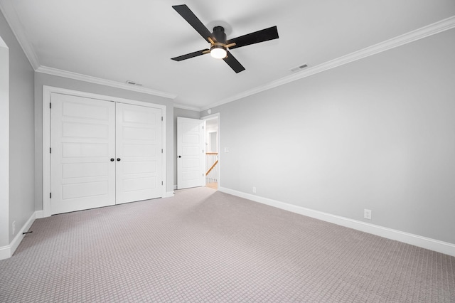 1311 Halifax Ct, Murfreesboro, TN 37130 - unfurnished bedroom with crown molding, baseboards, a closet, carpet flooring, and ceiling fan