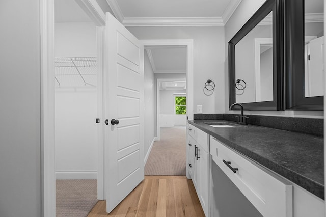 1311 Halifax Ct, Murfreesboro, TN 37130 - bathroom with wood finished floors, vanity, ornamental molding, and baseboards
