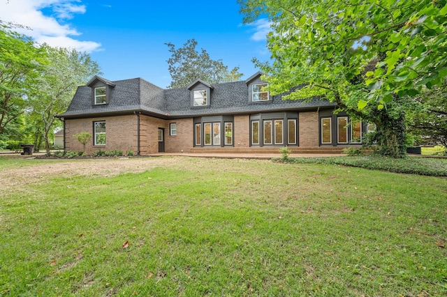 1311 Halifax Ct, Murfreesboro, TN 37130 - rear view of house with roof with shingles, brick siding, and a yard