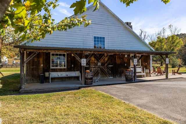 2133 Allisona Rd, Eagleville, TN 37060 - view of front facade featuring a front yard and covered porch