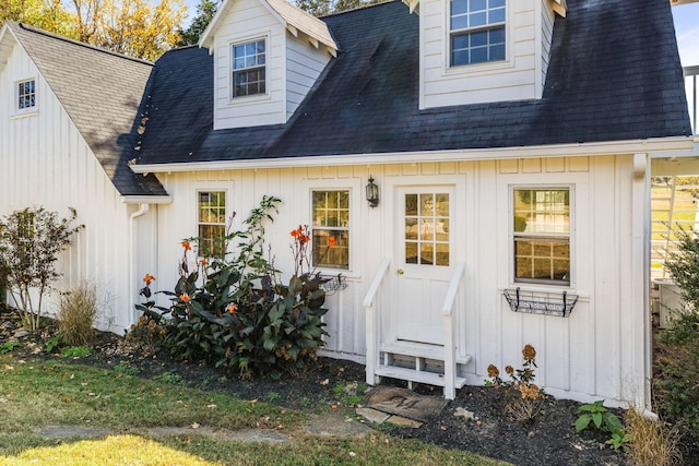 2133 Allisona Rd, Eagleville, TN 37060 - rear view of house with board and batten siding, a shingled roof, and entry steps