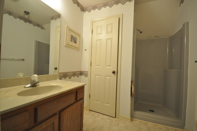 5620 Sango Rd, Clarksville, TN 37043 - bathroom with a walk in shower, vanity, and tile patterned floors
