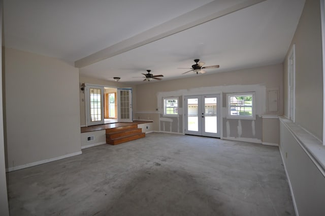 5620 Sango Rd, Clarksville, TN 37043 - unfurnished living room with french doors, unfinished concrete flooring, baseboards, and ceiling fan