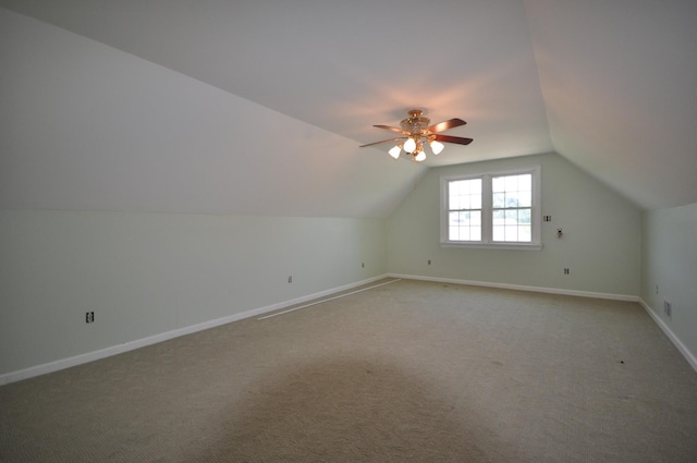 5620 Sango Rd, Clarksville, TN 37043 - additional living space featuring ceiling fan, vaulted ceiling, light carpet, and baseboards