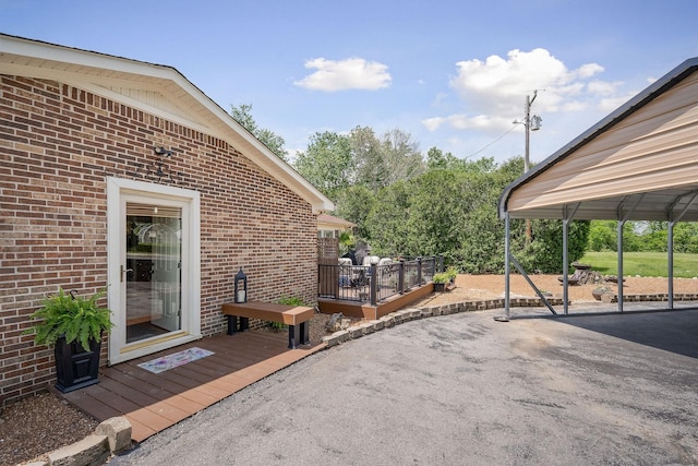 view of patio / terrace with a wooden deck