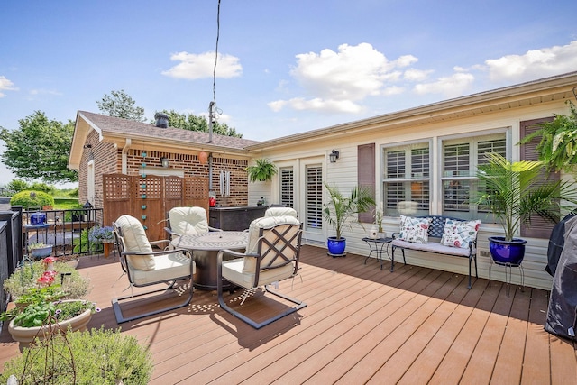 deck with outdoor dining space