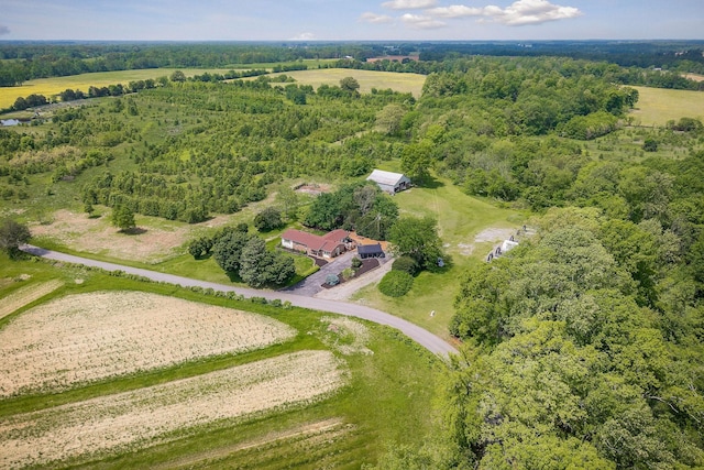 aerial view of property and surrounding area featuring rural landscape
