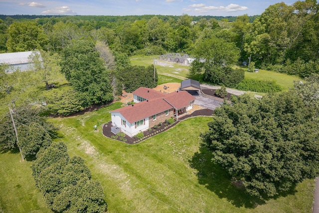 view from above of property featuring a forest