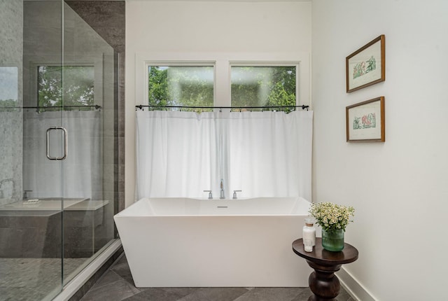 1411B Boscobel St, Nashville, TN 37206 - bathroom with a soaking tub, a shower stall, and baseboards