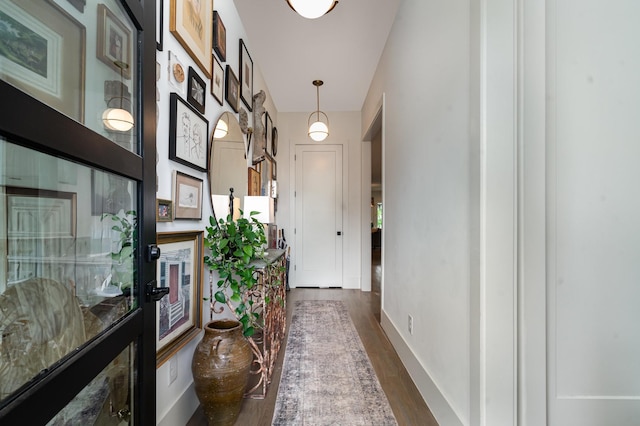 1411B Boscobel St, Nashville, TN 37206 - doorway featuring dark wood finished floors and baseboards