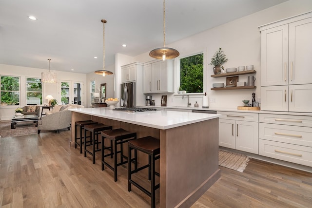 1411B Boscobel St, Nashville, TN 37206 - kitchen with appliances with stainless steel finishes, plenty of natural light, a kitchen island, a sink, and recessed lighting