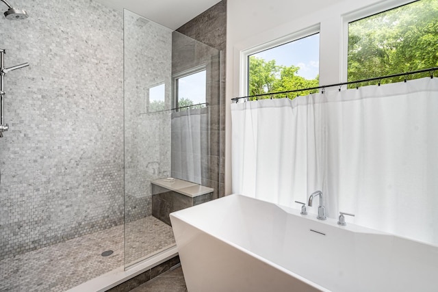 1411B Boscobel St, Nashville, TN 37206 - bathroom with plenty of natural light, tiled shower, and a freestanding tub