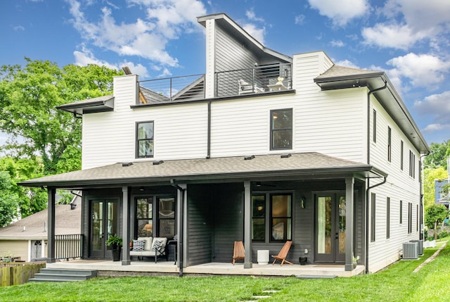 1411B Boscobel St, Nashville, TN 37206 - rear view of house featuring french doors, cooling unit, a lawn, a chimney, and an outdoor living space