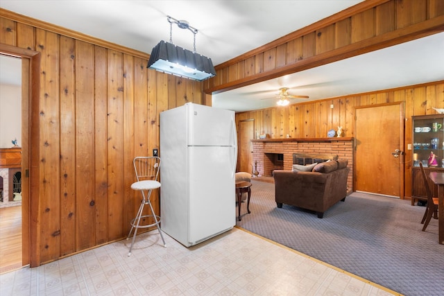 511 Catalina Dr, Nashville, TN 37217 - living area with wood walls, a brick fireplace, light floors, and ceiling fan