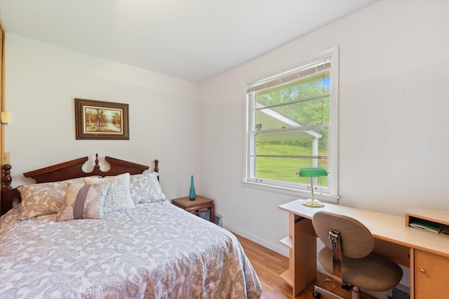 511 Catalina Dr, Nashville, TN 37217 - bedroom featuring wood finished floors, baseboards, and a desk