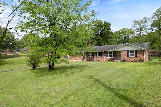 511 Catalina Dr, Nashville, TN 37217 - view of front of home with brick siding and a front yard