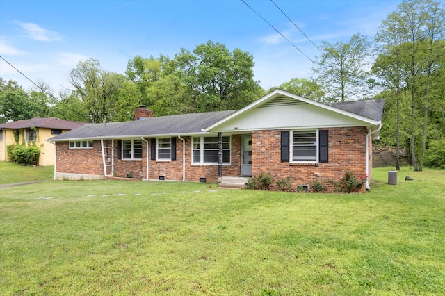 511 Catalina Dr, Nashville, TN 37217 - ranch-style home with a front yard, a chimney, central AC, and brick siding