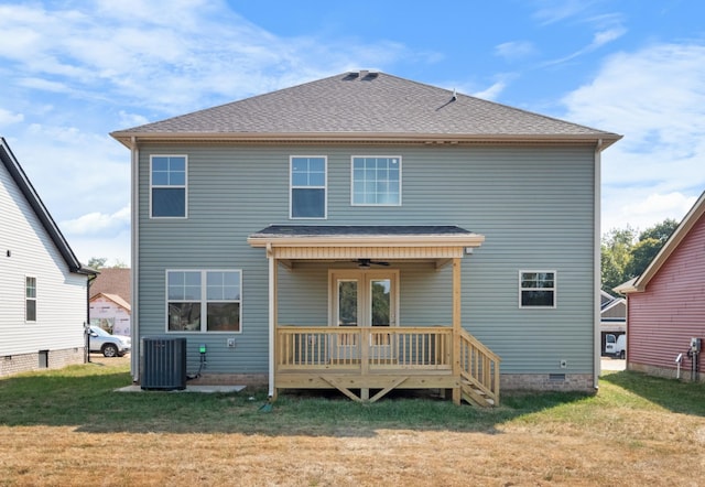 rear view of property featuring ceiling fan, central air condition unit, a lawn, and crawl space