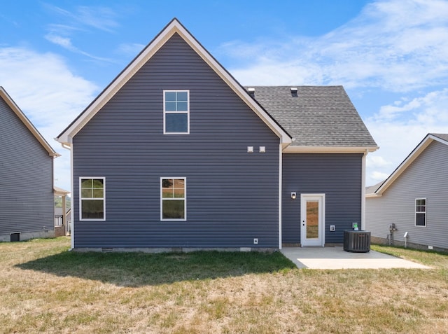 back of property with a patio, central AC, a lawn, and roof with shingles