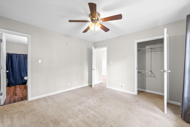 938 Merritt Lewis Ln, Clarksville, TN 37042 - unfurnished bedroom featuring a closet, carpet floors, baseboards, connected bathroom, and a ceiling fan