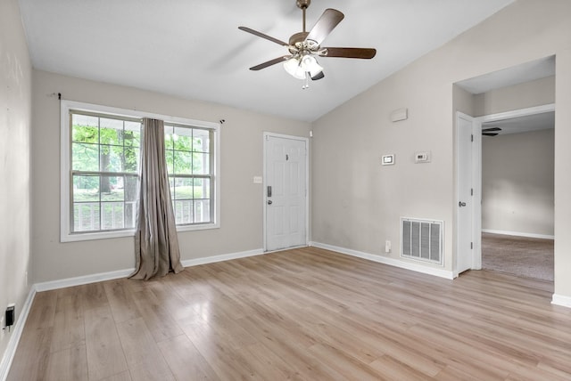 938 Merritt Lewis Ln, Clarksville, TN 37042 - unfurnished room with ceiling fan, lofted ceiling, light wood-type flooring, and baseboards