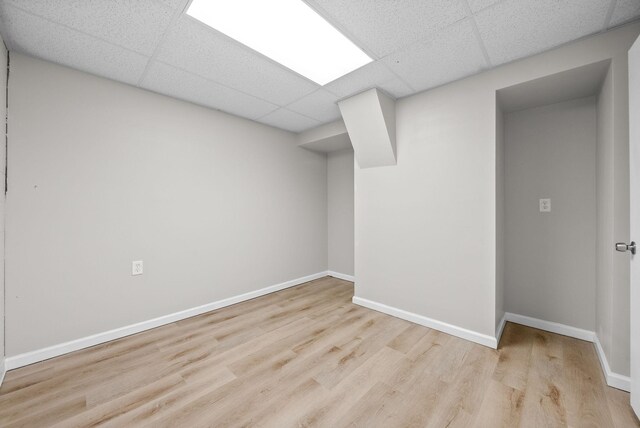 938 Merritt Lewis Ln, Clarksville, TN 37042 - finished basement featuring a drop ceiling, wood finished floors, and baseboards