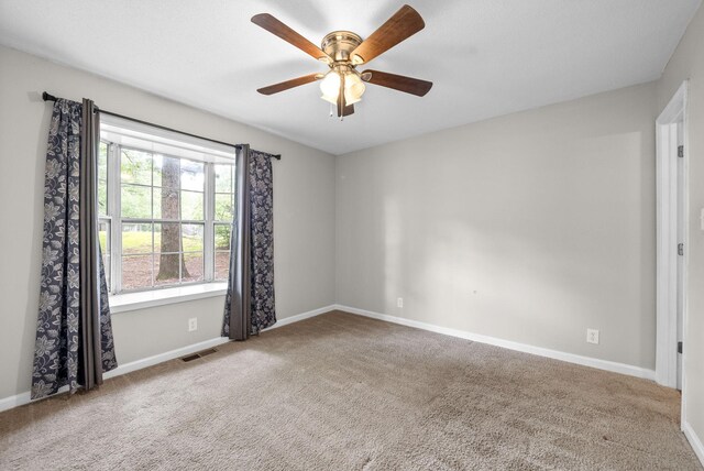 938 Merritt Lewis Ln, Clarksville, TN 37042 - unfurnished room featuring carpet, a ceiling fan, and baseboards
